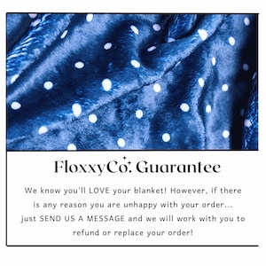 a blue blanket with white dots on it