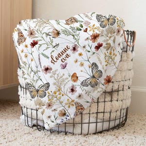 a basket with a blanket on top of it