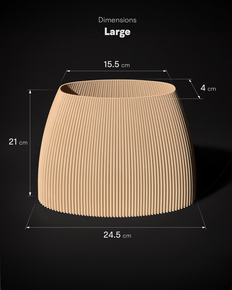 May include: A large, beige, corrugated cardboard planter with dimensions of 15.5 inches wide, 21 inches tall, and 24.5 inches long. The planter is shown on a black background.
