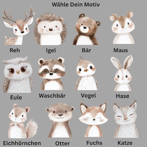 Op de afbeelding: Waterverfillustraties van verschillende bosdieren, waaronder een hert, een egel, een beer, een muis, een uil, een wasbeer, een vogel, een konijn, een eekhoorn, een otter, een vos en een kat. De tekst "W&auml;hle Dein Motiv" staat bovenaan.