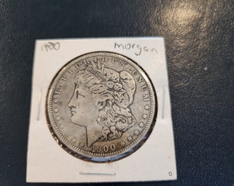 1900 P Morgan Silver Dollar is Fine conditioned and is from the Philadelphia mint. It's a inexpensive way to start collecting silver dollars