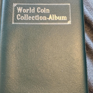 Small World Coin Collecting Album with 12 individual circulated coins from different countries. Coins vary by color, size and denomination.