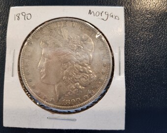 1890 P Morgan Silver Dollar is in  AU condition and is from Philadelphia mint. It is an inexpensive way to start collecting  silver dollars.