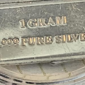 4 cute little shiny Silver Bars, 1 gram of .999 silver each. Minted at the United States Commemorative Gallery. Certificate of Authenticity