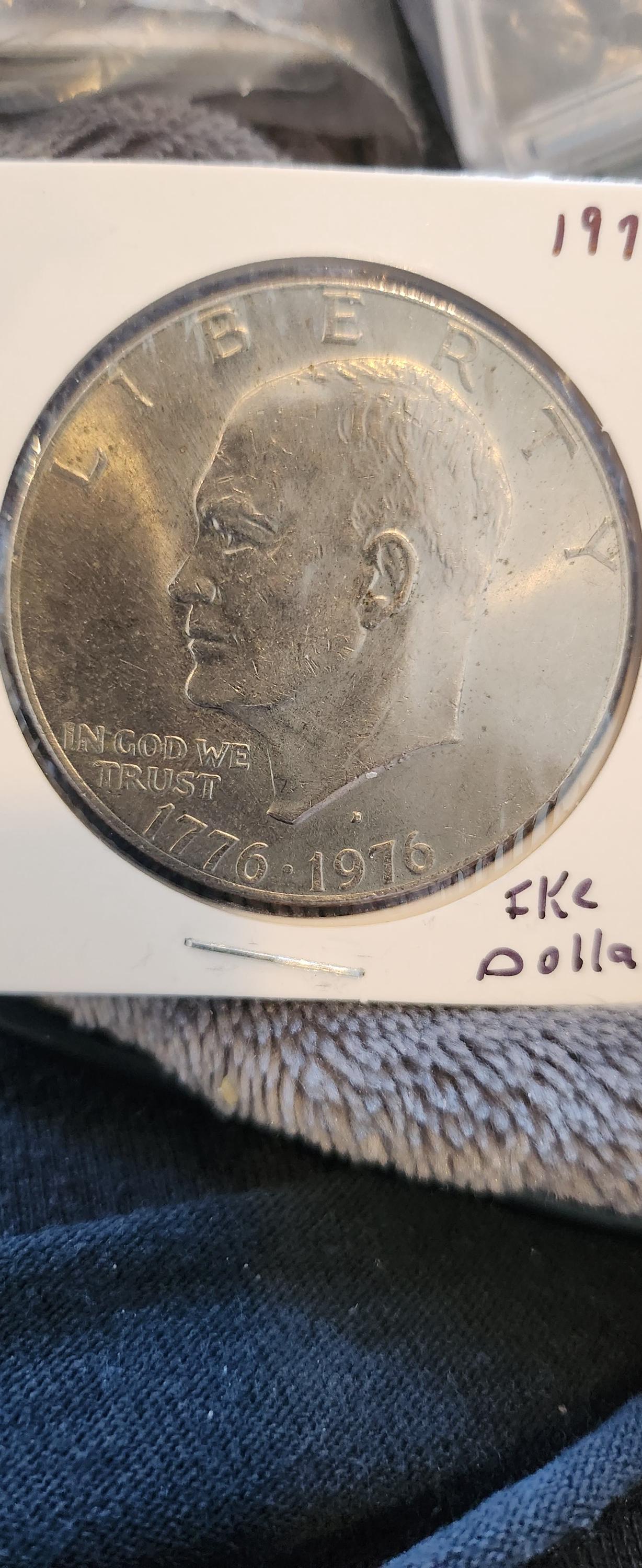 1976 Bicentennial Coin Set. 1 D Eisenhower, uncirculated D Kennedy Half Dollar, and 2 VF D and P quarters, one AU cent.