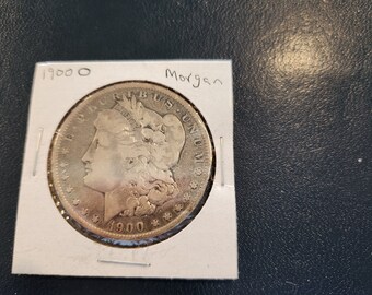 1900 O Morgan Silver Dollar is Good conditioned and is from New Orleans Mint. This is an inexpensive way to start collecting silver dollars.