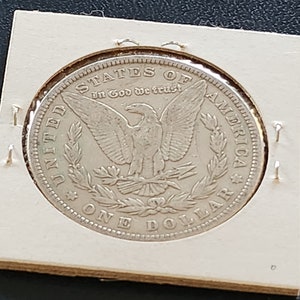 This 1881 O Morgan Silver Dollar is in AU condition and is from New Orleans. It is an inexpensive way to start collecting silver dollars. image 2