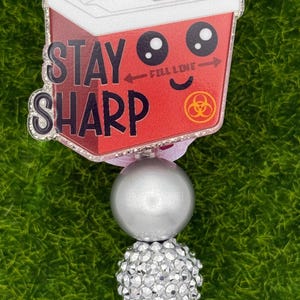 Sharps container-needles-funny-badge reel