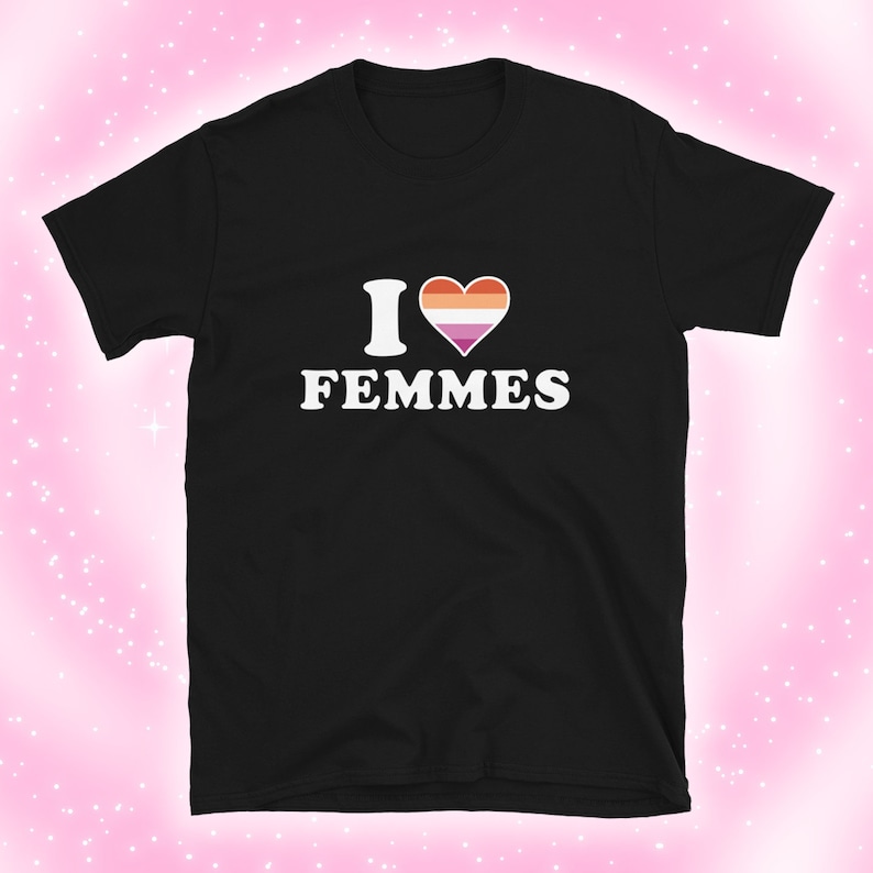 May include: Black t-shirt with a white heart featuring a lesbian pride flag and the text "I &hearts; FEMMES" in white.