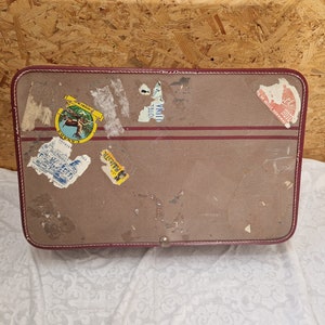 1960&#39;s Original Suitcase with travel stickers