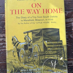 De camino a casa ~ Copyright 1962 ~ Incluye carta de Laura Ingalls Wilder ~ La pequeña casa en la pradera