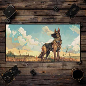 May include: A brown and black German Shepherd dog stands in a field with a blue sky and white clouds in the background. The dog is looking to the left of the image. The field is green and there are some tall grasses in the foreground.