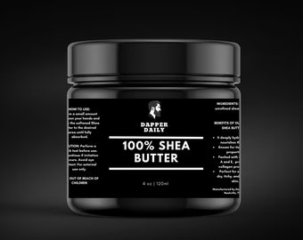 May include: A black jar with a white label that reads "Dapper Daily 100% Shea Butter 4 oz | 120ml". The label also includes information about how to use the product, ingredients, and benefits of shea butter.