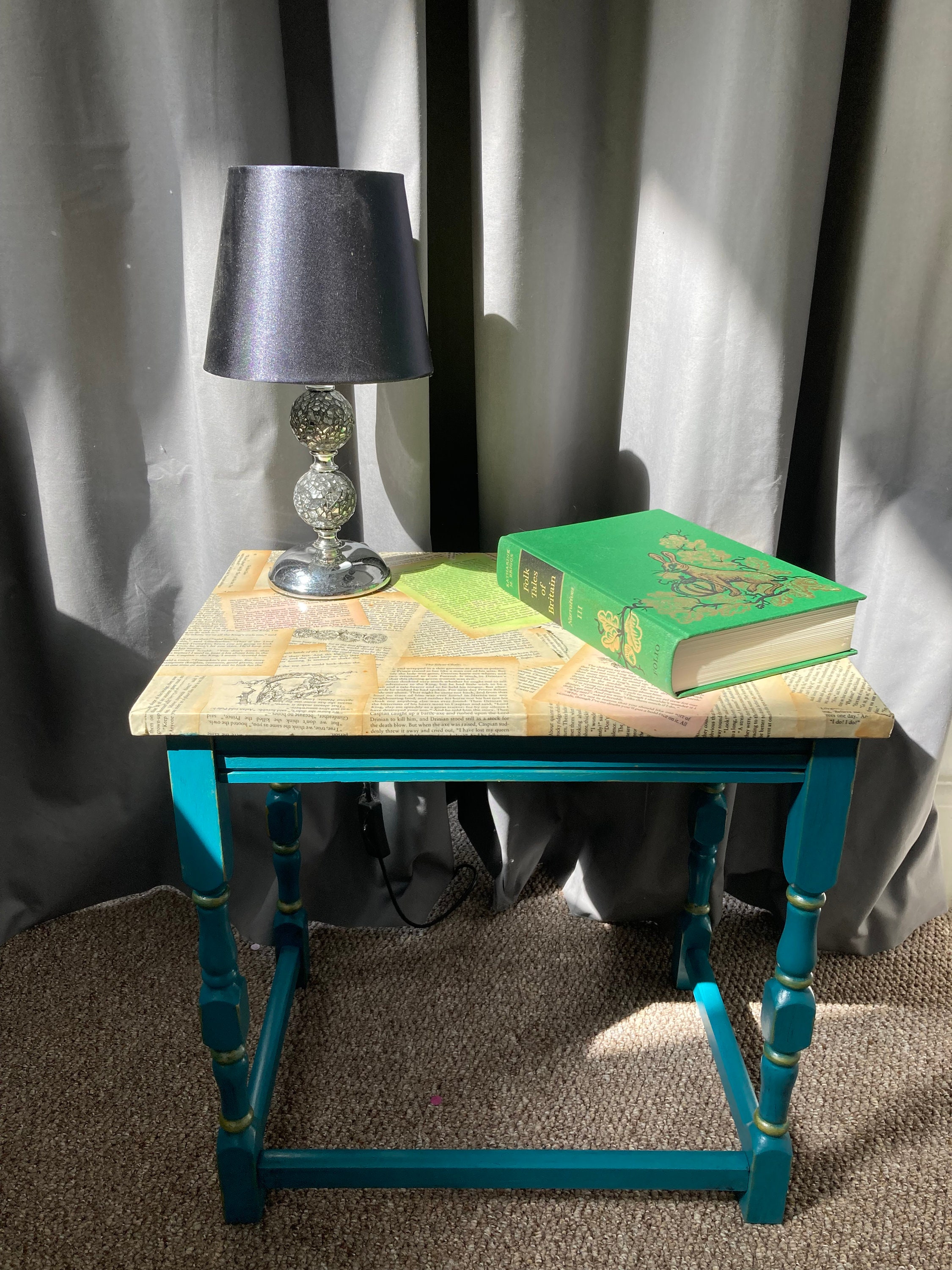 Teal end sale table with storage
