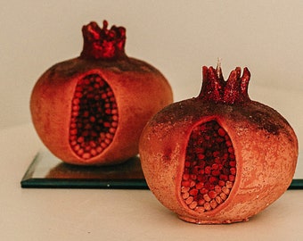 An handmade pomegranate one candle