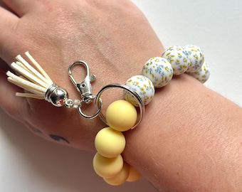 Llavero con pulsera de cuentas florales – Accesorio antiestrés con cuentas de silicona