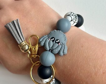 Llavero de pulsera con cuentas de silicona y araña – Llavero antiestrés