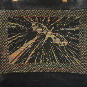 May include: A black and white woven tapestry with a colourful border. The design features a stylised tree with branches extending outwards.