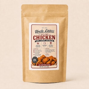 May include: A brown paper pouch of Uncle Eddie's EZ Fry Chicken mix. The label features the text 'Uncle Eddie's EZ FRY CHICKEN', instructions, ingredients, and a picture of fried chicken. The net weight is listed as 12 oz (340g) at the bottom.
