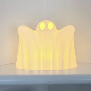Cute Ghost with LED light, Halloween decoration with warm flickering tea light. Glowing mini ghost decoration