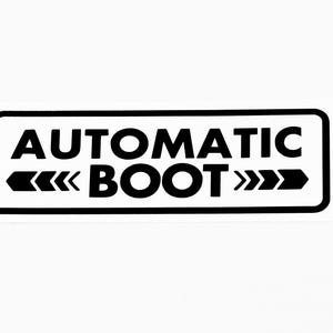 May include: Black and white sticker with the text "AUTOMATIC BOOT" and arrows pointing in both directions.
