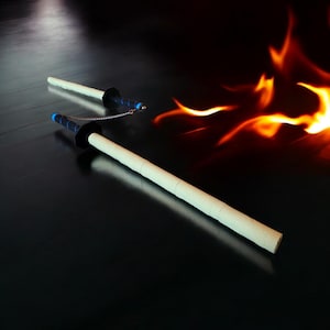 May include: A set of three ceramic nesting bowls in shades of blue, green, and white. The bowls feature a speckled glaze and a simple, modern design. The largest bowl is approximately 7 inches in diameter.