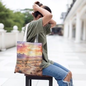 A product mockup showing one of our Watercolor Desert Background papers printed on a canvas tote bag.