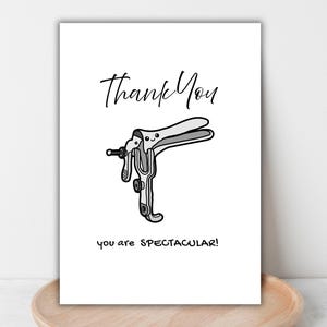 May include: A white card with the words "Thank You" in a script font above a cartoon illustration of a speculum. Below the illustration, the words "you are SPECTACULAR!" are printed.