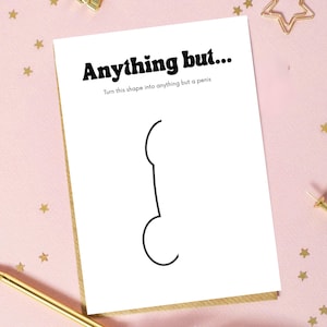 May include: A white card with the text "Anything but..." and a line drawing of a shape. The card is on a pink surface with gold stars and a gold pen. The text below the title reads "Turn this shape into anything but a penis."