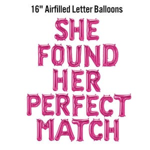 May include: Pink air-filled letter balloons spelling "SHE FOUND HER PERFECT MATCH" on a white background. The balloons are 16 inches in size, ideal for a wedding or engagement celebration.