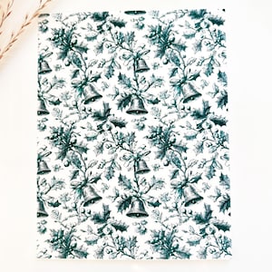 May include: A rectangular sheet with a repeating pattern of green bells, holly leaves, and berries on a white background. The design has a vintage, hand-drawn aesthetic, evoking a festive holiday theme.