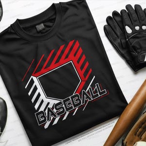 May include: Black baseball t-shirt with a red and white graphic of a home plate and the word "BASEBALL". The image also includes a baseball glove, bat, ball, and a black baseball glove.