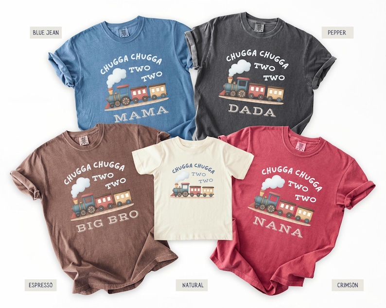 May include: Five short-sleeved t-shirts in various colors, including blue, gray, brown, cream, and red. Each shirt features a train graphic with the text "Chugga Chugga Two Two" and a family member's title: Mama, Dada, Big Bro, or Nana.