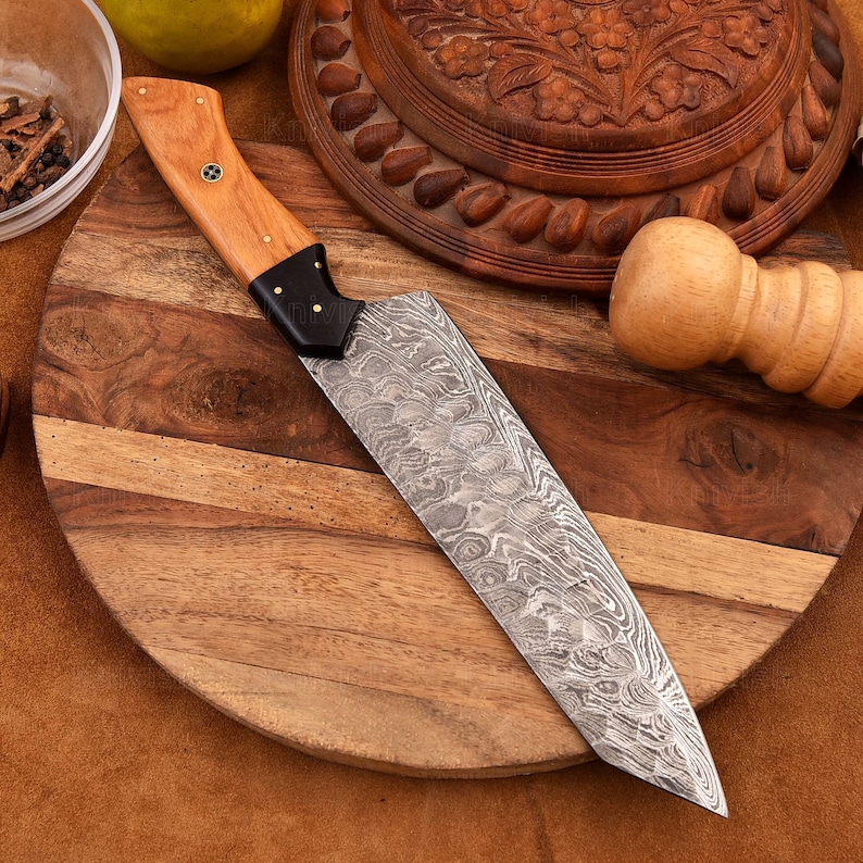 chef’s knife 
Chef’s knife slicing vegetables Meat Cutting Fruit Cutting 8-inch chef’s knife chef’s knife used for meal prepration A high-quality knife stays sharp longer and sharpens easily.15°–20° edge angle
Wüsthof Shun Miyabi, Global MAC Victorinox, Tojiro, Mercer Imarku, Cuisinart Forged Blade Stronger better balance more durable chef knife kitchen knife professional chef knife cooking knife kitchen essentials culinary tools chef tools kitchen gear high-quality knife stainless steel knife