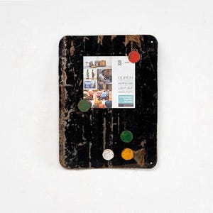 Magnetic board made from recycled oil drums with 5 colorful magnets Black
