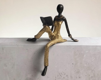 Bronze sculpture "Reading Grace" by Issouf Iboudou