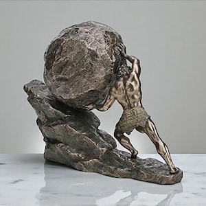 May include: Bronze sculpture depicting a muscular figure pushing a large, textured boulder uphill. The figure is clad in a loincloth, and the sculpture rests on a rocky base. The color palette is primarily bronze and brown.