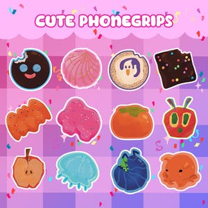 May include: A collection of twelve colorful phone grips featuring various designs including a bitten chocolate cookie, a pink concha, a ghost, a brownie, a gummy candy, a pink blob, a persimmon, a caterpillar, an apple slice, a jellyfish, a pill bug, and an orange creature, with the text CUTE PHONEGRIPS at the top.