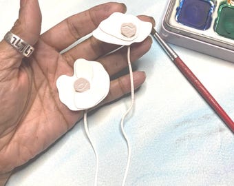 Papel troquelado con diseño de amapolas en acuarela para hacer tarjetas y álbumes de recortes.