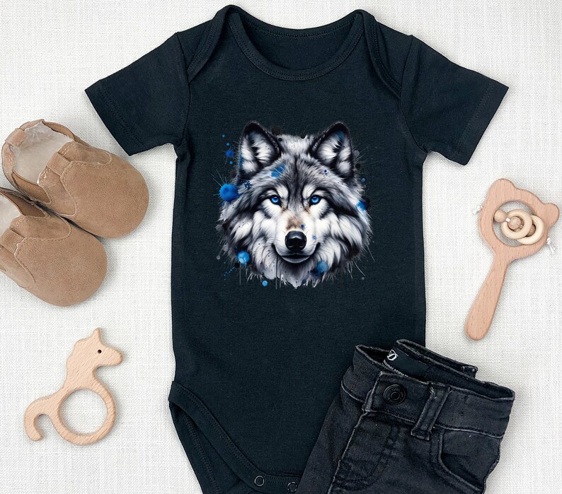May include: Black baby onesie with a watercolor-style wolf head graphic in shades of gray and blue.
