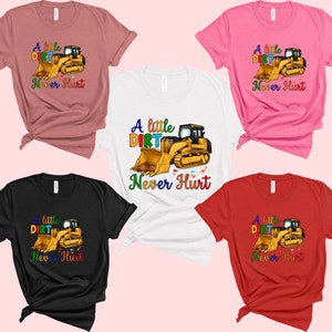 May include: Five different color t-shirts with a graphic of a yellow construction vehicle and the text "A little dirt never hurt".