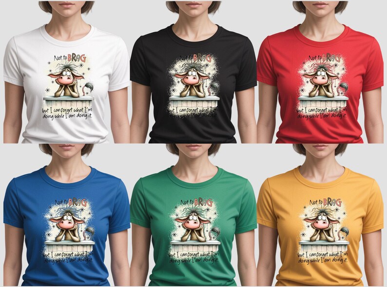 May include: A collection of t-shirts in white, black, red, blue, green, and yellow. Each shirt features a cartoon cow design with the text "Not to BRAG" and "but I can forget what I'm doing while I am doing it."