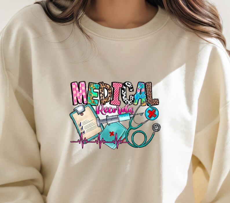 May include: A white sweatshirt with a colorful graphic design that says "MEDICAL Records" with a stethoscope, syringe, and clipboard.