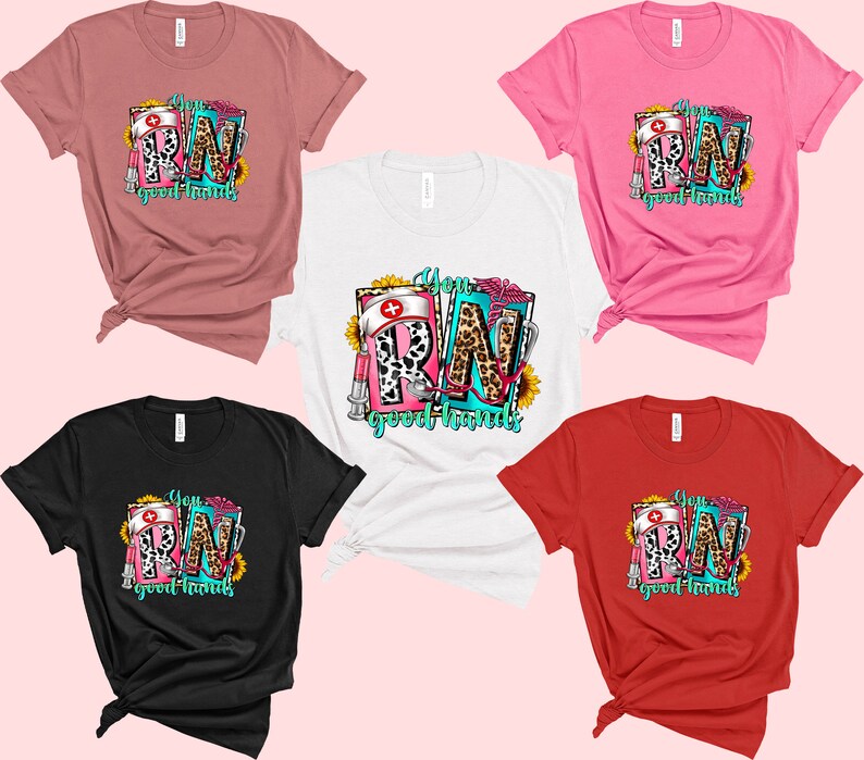 May include: Five different color t-shirts with a graphic design of the letters RN in a colorful, patterned design with the text "You RN good hands".