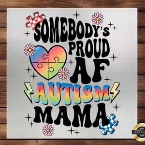 May include: A colorful graphic design with a rainbow heart and the text "Somebody's Proud AF Autism Mama".