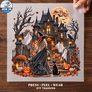 May include: A DTF transfer sheet featuring a Halloween scene with a witch in a black dress and hat holding a lantern, standing before a haunted mansion under a full moon. The design includes ghosts, black cats, pumpkins, and autumn leaves.