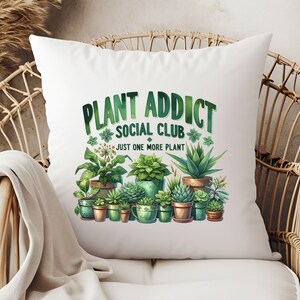 May include: White cushion with a green and brown illustration of potted plants and the text "Plant Addict Social Club Just One More Plant".