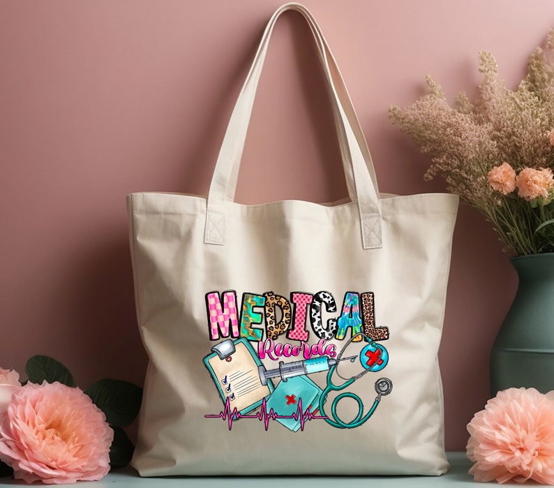 May include: A white canvas tote bag with a colorful design featuring the words "MEDICAL RECORDS" and medical symbols like a stethoscope, syringe, and a clipboard. The design is in a patchwork style with different patterns and colors.