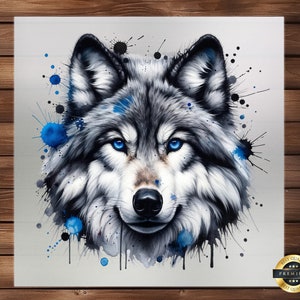 May include: A watercolor painting of a wolf's face with blue and black paint splatters. The wolf has blue eyes and a white and gray coat.