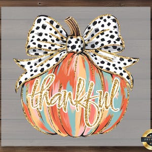 May include: A colorful pumpkin illustration with the word "thankful" in gold glitter script. The pumpkin has orange, teal, and peach brushstrokes, topped with a black and white polka dot bow with gold trim. A fall-themed design.